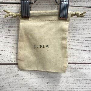 Small cream J. Crew cloth jewelry dust bag 4" x 5"